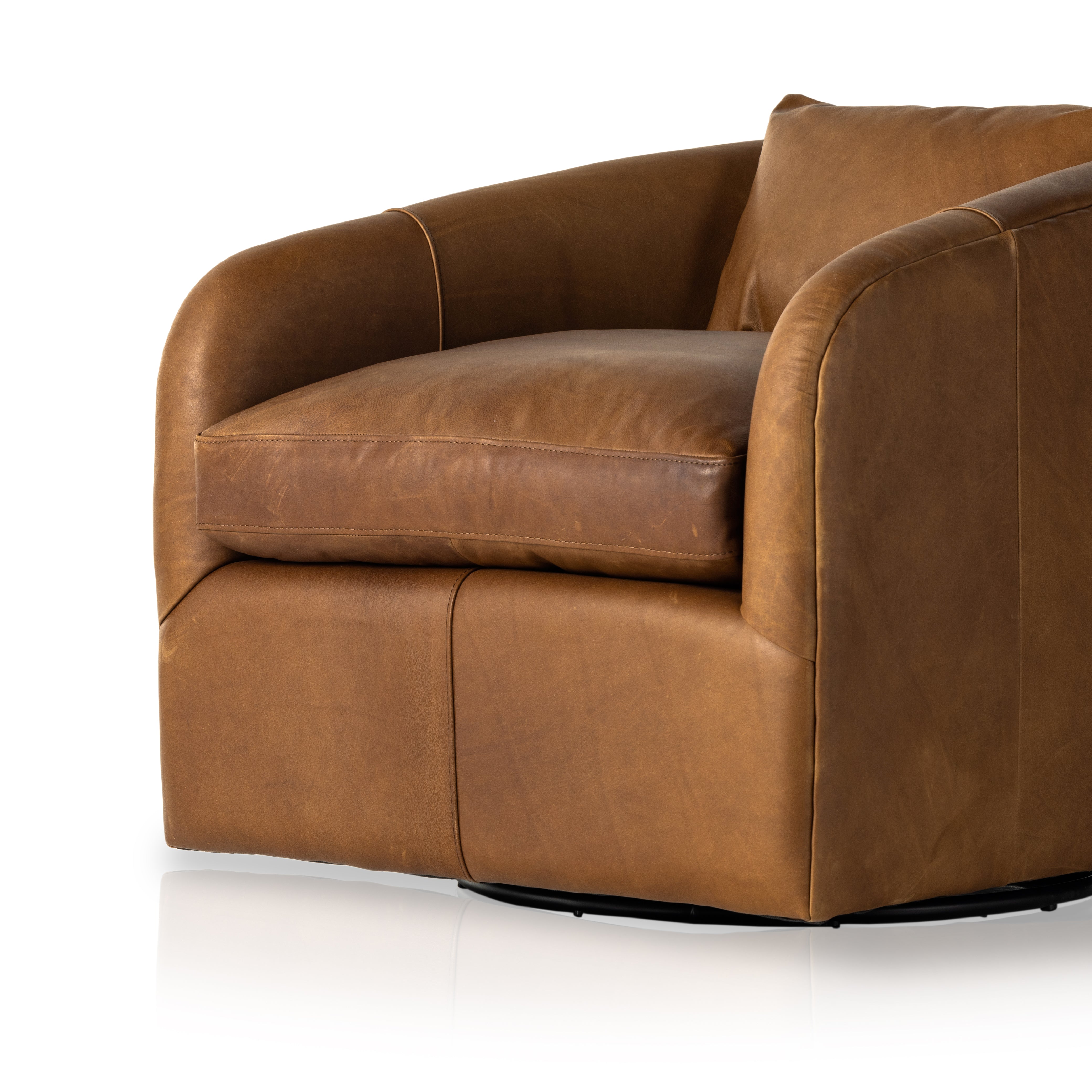Angled arms and a single pillow create a laid-back look, with a 360-degree swivel for ease in your office or living room. Sourced from one of the oldest family-owned tanneries in Italyâ€™s Bassano del Grappa, our top-grain heirloom leather covering is salvaged and processed from upcycled hides featuring an abundance of natural markings, scars and color variations. Amethyst Home provides interior design, new construction, custom furniture, and area rugs in the Austin metro area.