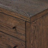 Straight planks of solid umber oak and veneer encase this spacious dresser for an understated modern look. Deep wood grain adds natural character. Invisible wireless charging for Android and Apple products.Collection: Hamilto Amethyst Home provides interior design, new home construction design consulting, vintage area rugs, and lighting in the Seattle metro area.