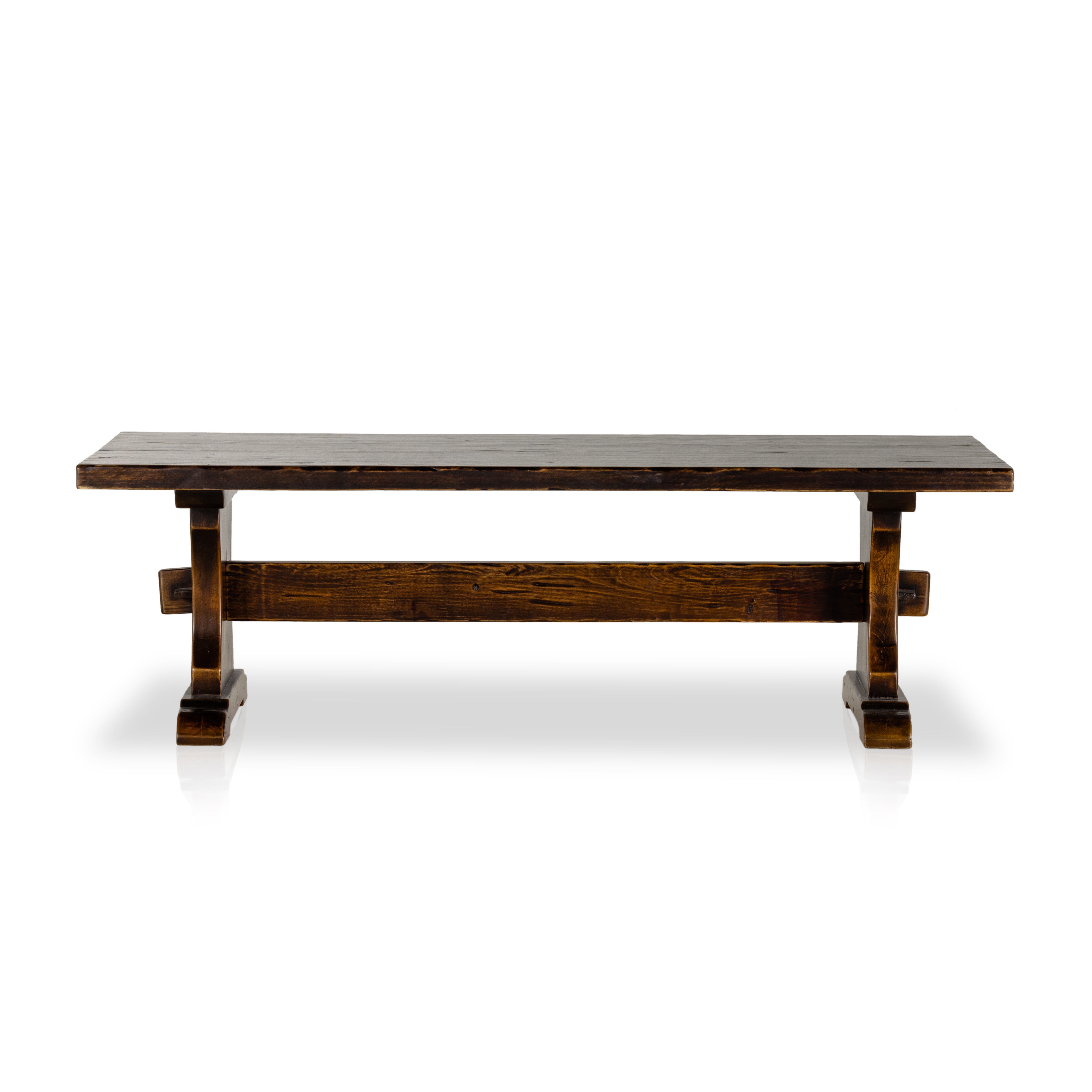 Invoke a timeless, rustic charm in your living space with the Trestle Coffee Table! This robust and weighty piece is finished in a distressed walnut, inspired by antique styling and designed to last. Make a statement today! Amethyst Home provides interior design, new construction, custom furniture and area rugs in the Miami metro area