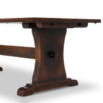 Vintage shaping meets distressed walnut and joint detailing on the legs, making this trestle dining table feel like a true antique. Two extension bread boards attach to the ends, comfortably seating 10 when extended.Collection: Cordell Amethyst Home provides interior design, new home construction design consulting, vintage area rugs, and lighting in the Charlotte metro area.