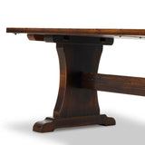 Vintage shaping meets distressed walnut and joint detailing on the legs, making this trestle dining table feel like a true antique. Two extension bread boards attach to the ends, comfortably seating 10 when extended.Collection: Cordell Amethyst Home provides interior design, new home construction design consulting, vintage area rugs, and lighting in the Laguna Beach metro area.