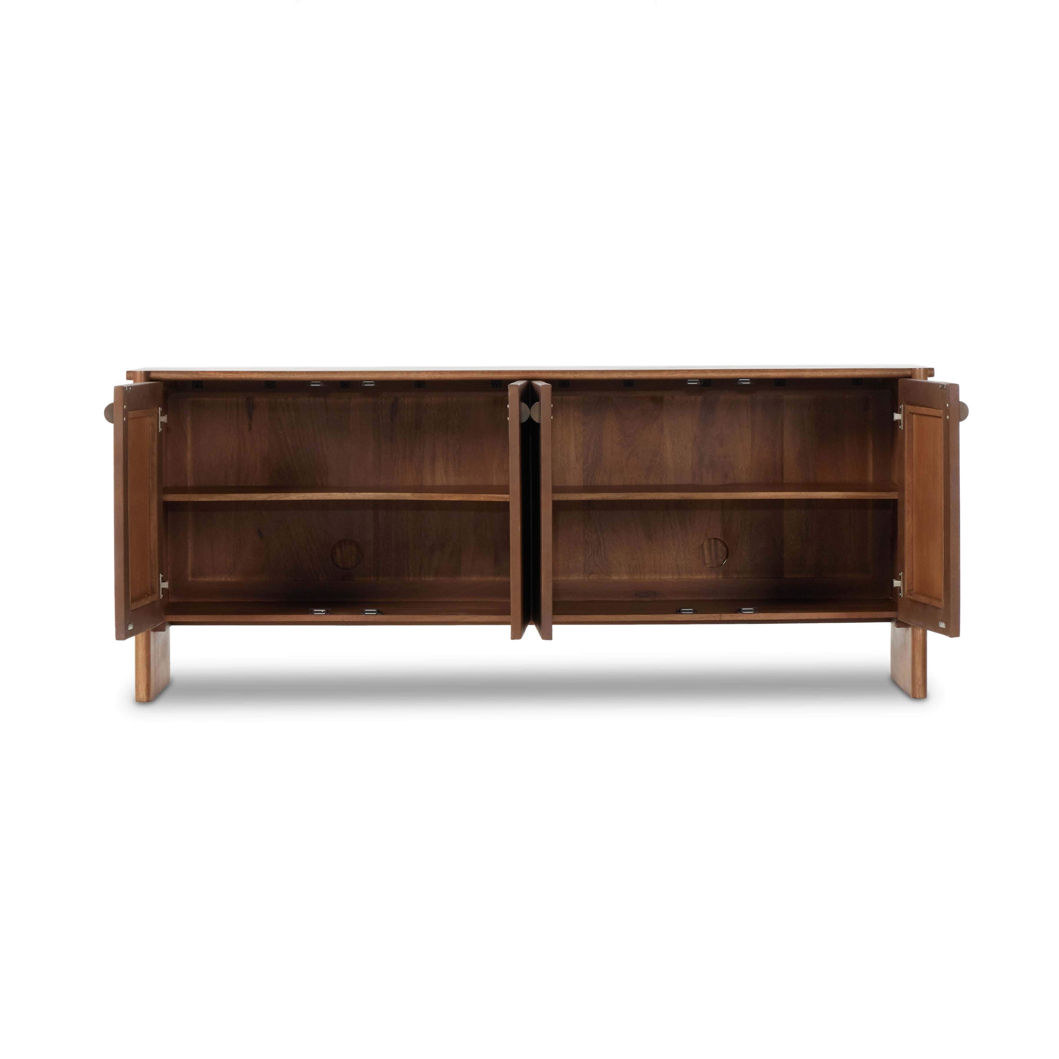 Curved edges and connection points meet leather door fronts, creating a smooth hand feel and look. Rounded offset hardware finishes this mango wood sideboard. Amethyst Home provides interior design, new construction, custom furniture, and area rugs in the Tampa metro area.