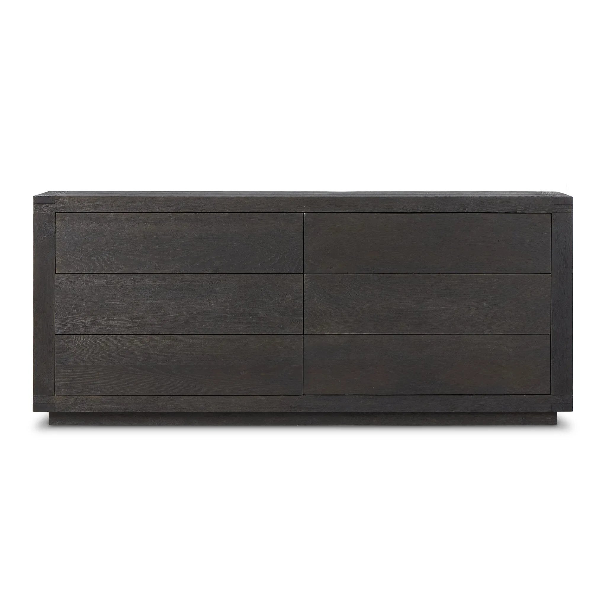 Black-finished oak shapes a streamlined box-style dresser, with lap joint corners for a detail-driven touch.Collection: Bennet Amethyst Home provides interior design, new home construction design consulting, vintage area rugs, and lighting in the Charlotte metro area.
