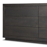 Black-finished oak shapes a streamlined box-style dresser, with lap joint corners for a detail-driven touch.Collection: Bennet Amethyst Home provides interior design, new home construction design consulting, vintage area rugs, and lighting in the Des Moines metro area.