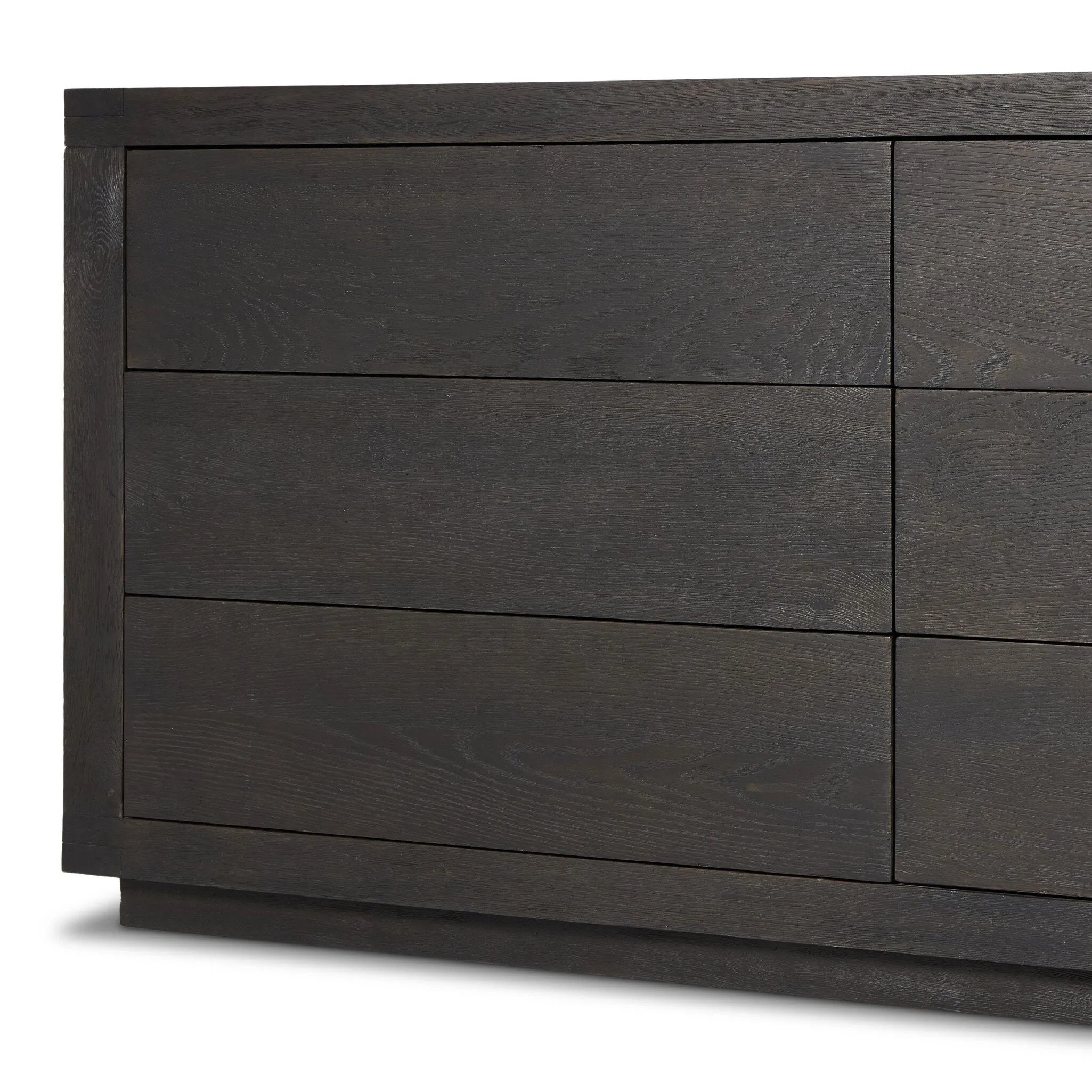 Black-finished oak shapes a streamlined box-style dresser, with lap joint corners for a detail-driven touch.Collection: Bennet Amethyst Home provides interior design, new home construction design consulting, vintage area rugs, and lighting in the Des Moines metro area.