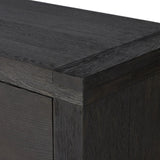 Black-finished oak shapes a streamlined box-style dresser, with lap joint corners for a detail-driven touch.Collection: Bennet Amethyst Home provides interior design, new home construction design consulting, vintage area rugs, and lighting in the Seattle metro area.