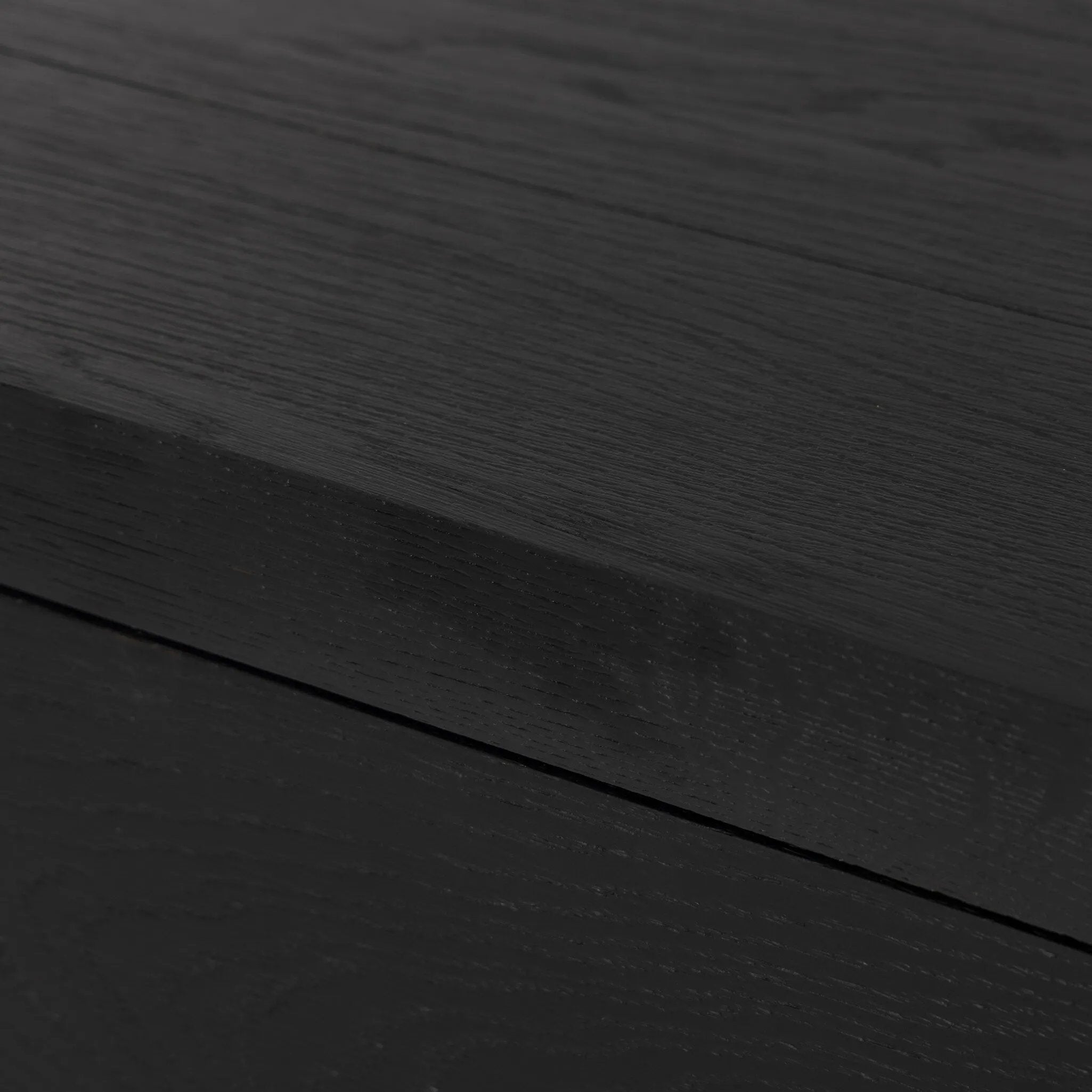 Featuring Warby Worn Black Oak Nightstand by Four Hands at Amethyst Home. Solid acacia shapes a streamlined box-style nightstand, with lap joint corners for a detail-driven touch. Finished with smooth, push-latch drawer glides.Collection: BennettColors: Worn Black Oak ,Worn Black VeneerMaterials: Solid Oak ,Thick Oak Veneer Weight: 94.8 lbs. Amethyst Home provides interior design, new home construction design consulting, vintage area rugs, and lighting in the Calabasas metro area.