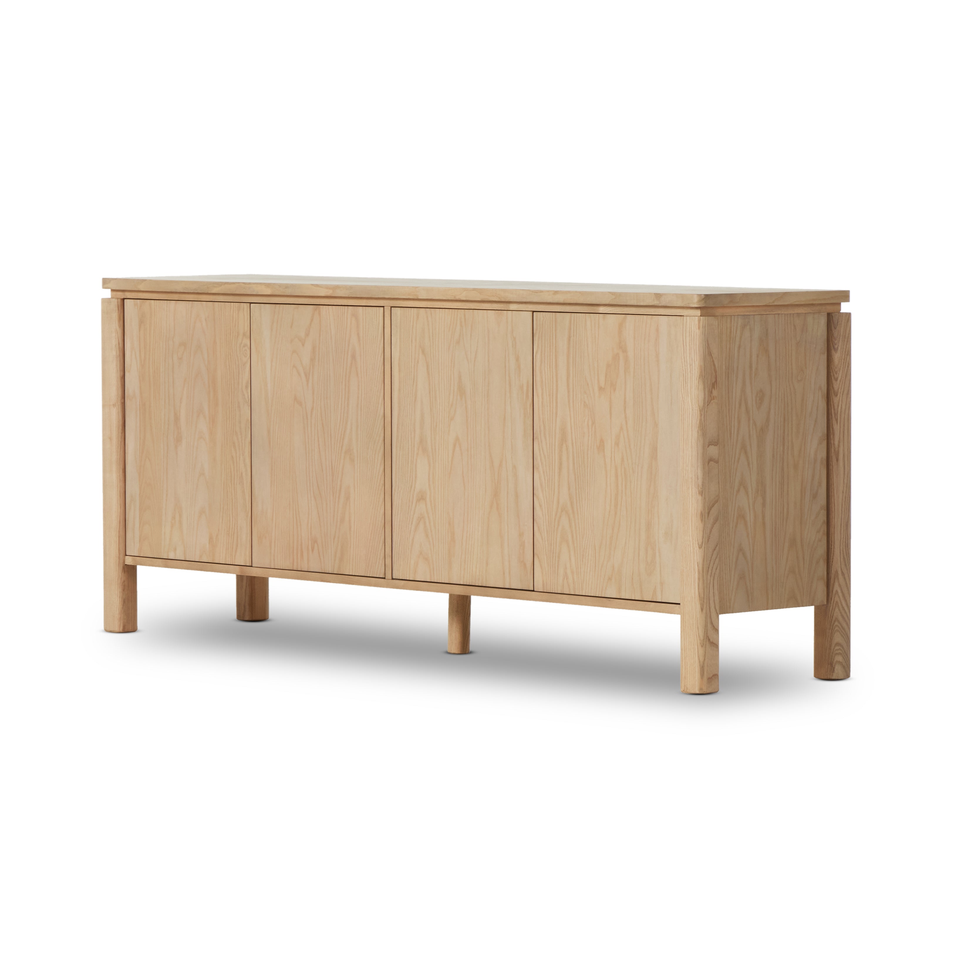 Large, rounded legs support this sleek sideboard with a reveal detail at the top. A beautiful ash finish showcases and highlights the natural wood grain. Amethyst Home provides interior design, new construction, custom furniture, and area rugs in the Des Moines metro area.