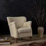 Inspired by centuries of design from old-world libraries, the Wycliffe Harben Ivory Chair re-invents a classic theme for timeless elegance. Top-grain, hand-finished leathers feel worn, adding interest and age to modern frames.  Amethyst Home provides interior design services, furniture, rugs, and lighting in the Calabasas metro area.