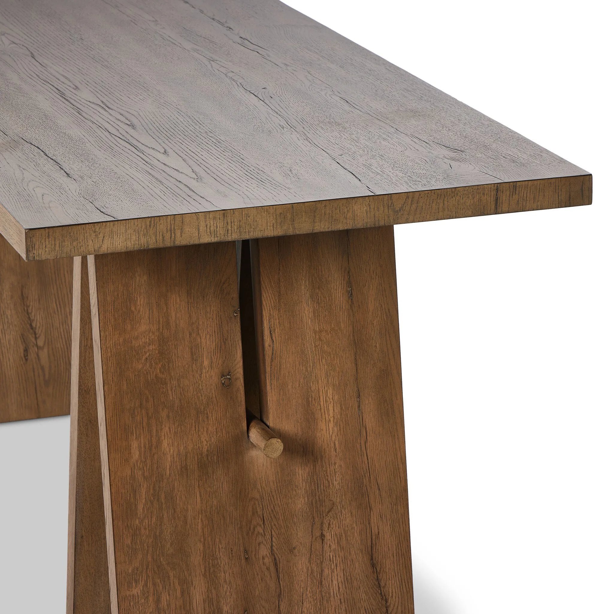 A minimalist frame on this large-scale desk lets the natural character of cracked oak take center stage. Designed with A-frame legs with exposed wood dowel joinery.Collection: Haide Amethyst Home provides interior design, new home construction design consulting, vintage area rugs, and lighting in the San Diego metro area.