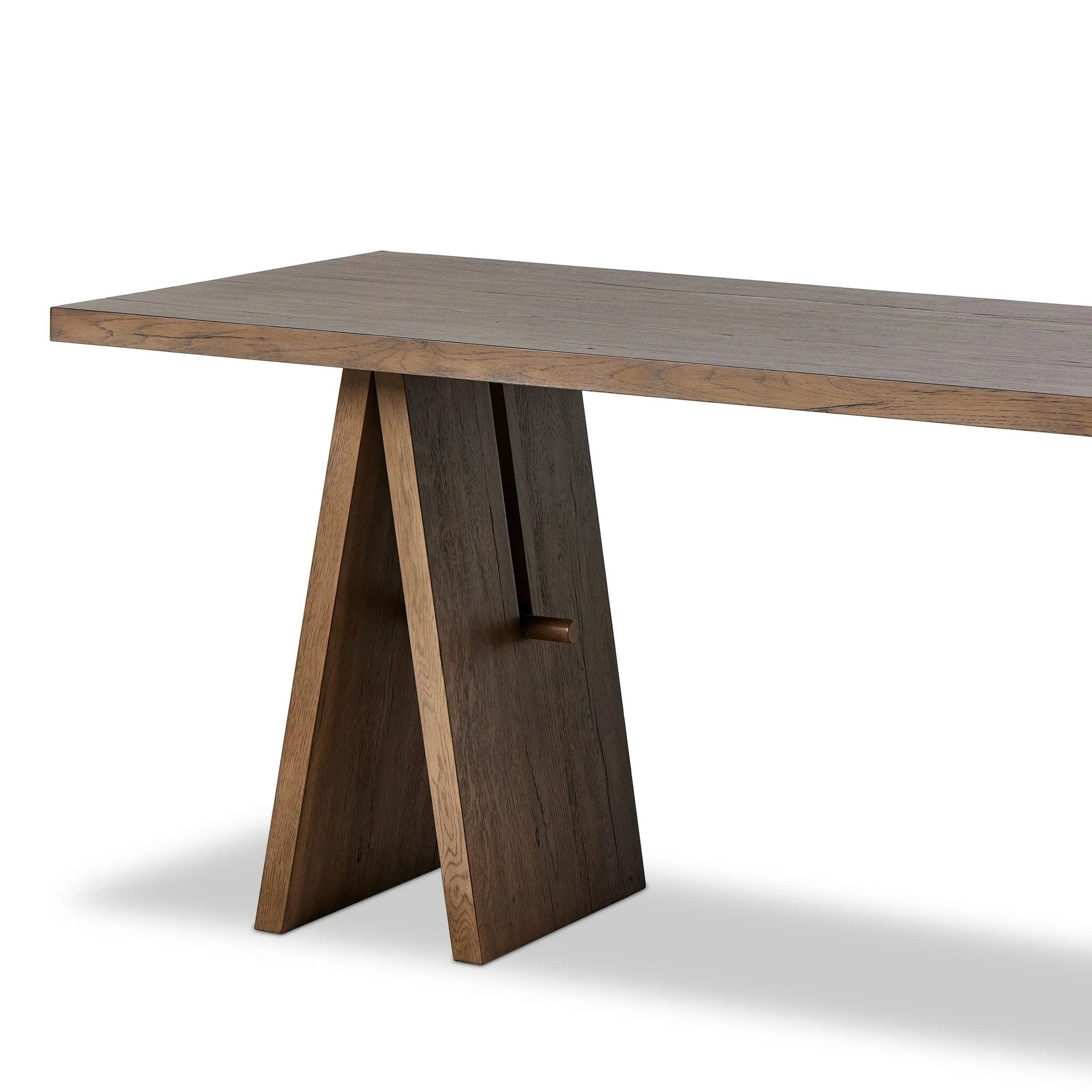 A minimalist frame on this large-scale desk lets the natural character of cracked oak take center stage. Designed with A-frame legs with exposed wood dowel joinery.Collection: Haide Amethyst Home provides interior design, new home construction design consulting, vintage area rugs, and lighting in the Winter Garden metro area.