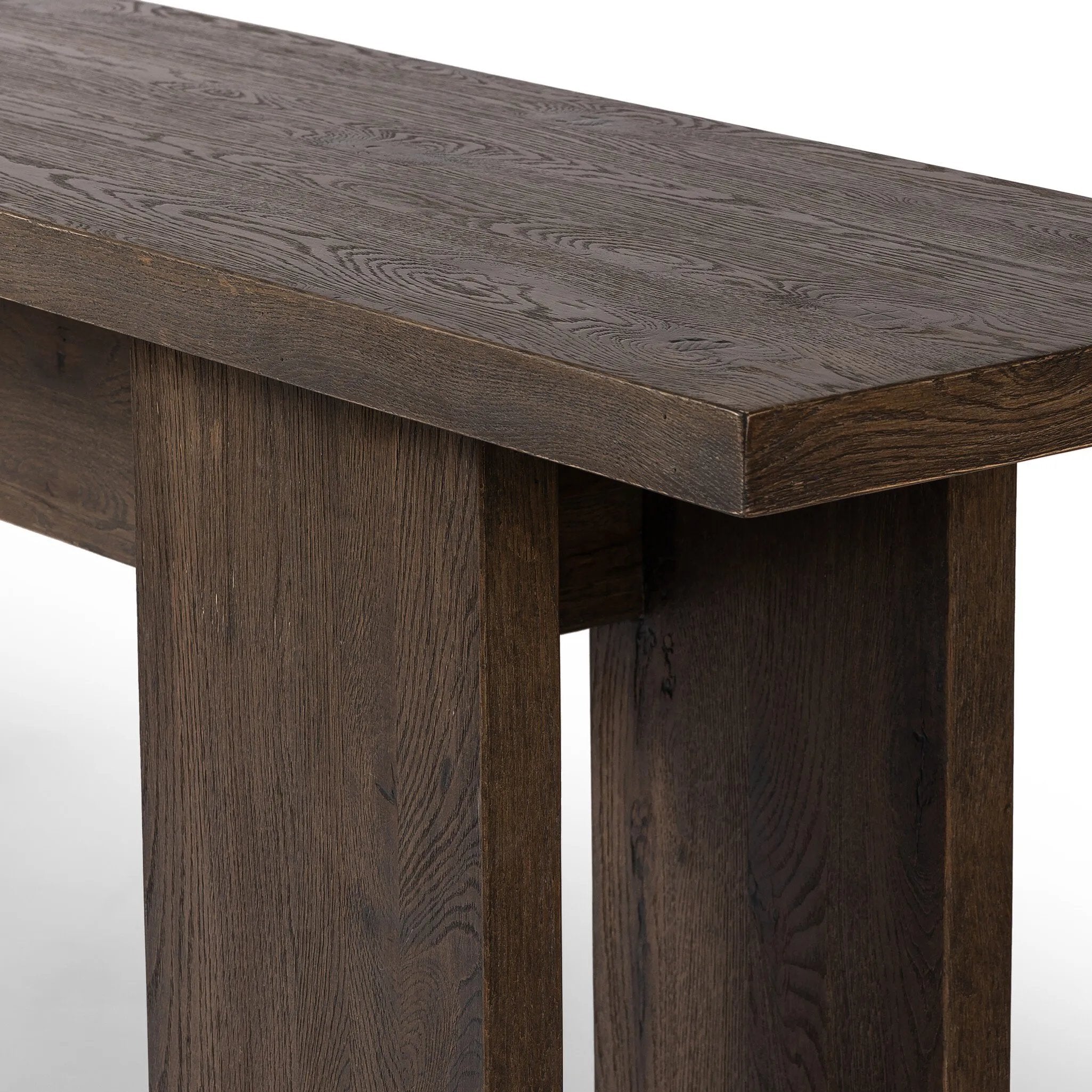 With wide proportions and natural presence, an open-style console table of dark grey oak veneer features beautiful natural texture.Collection: Irondal Amethyst Home provides interior design, new home construction design consulting, vintage area rugs, and lighting in the Park City metro area.