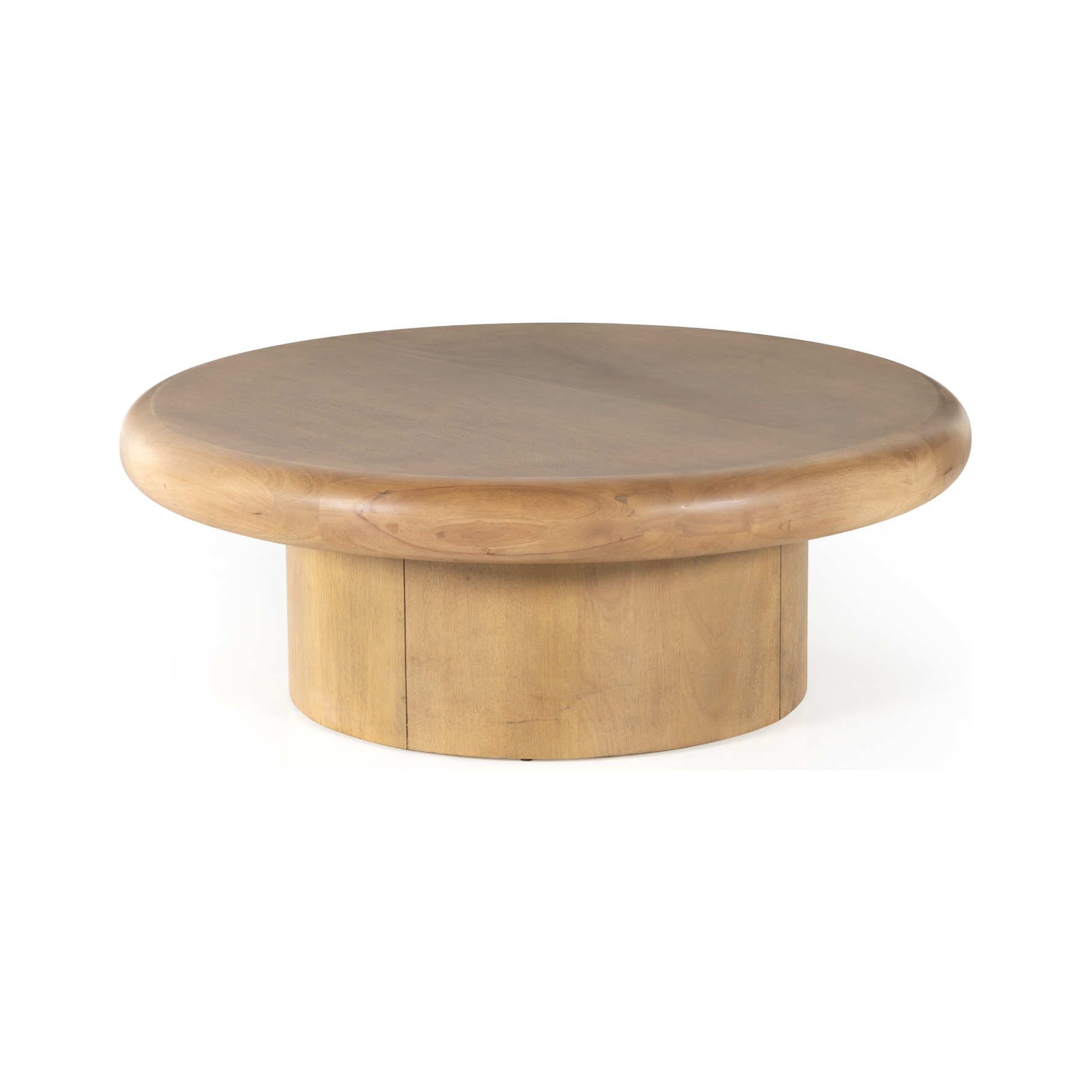 The Zach coffee table in burnished parawood features a pedestal-style base on a rounded tabletop with bullnose edging, for style and softness alike. Amethyst Home provides interior design, furniture, rugs, and design services in the Omaha metro area.