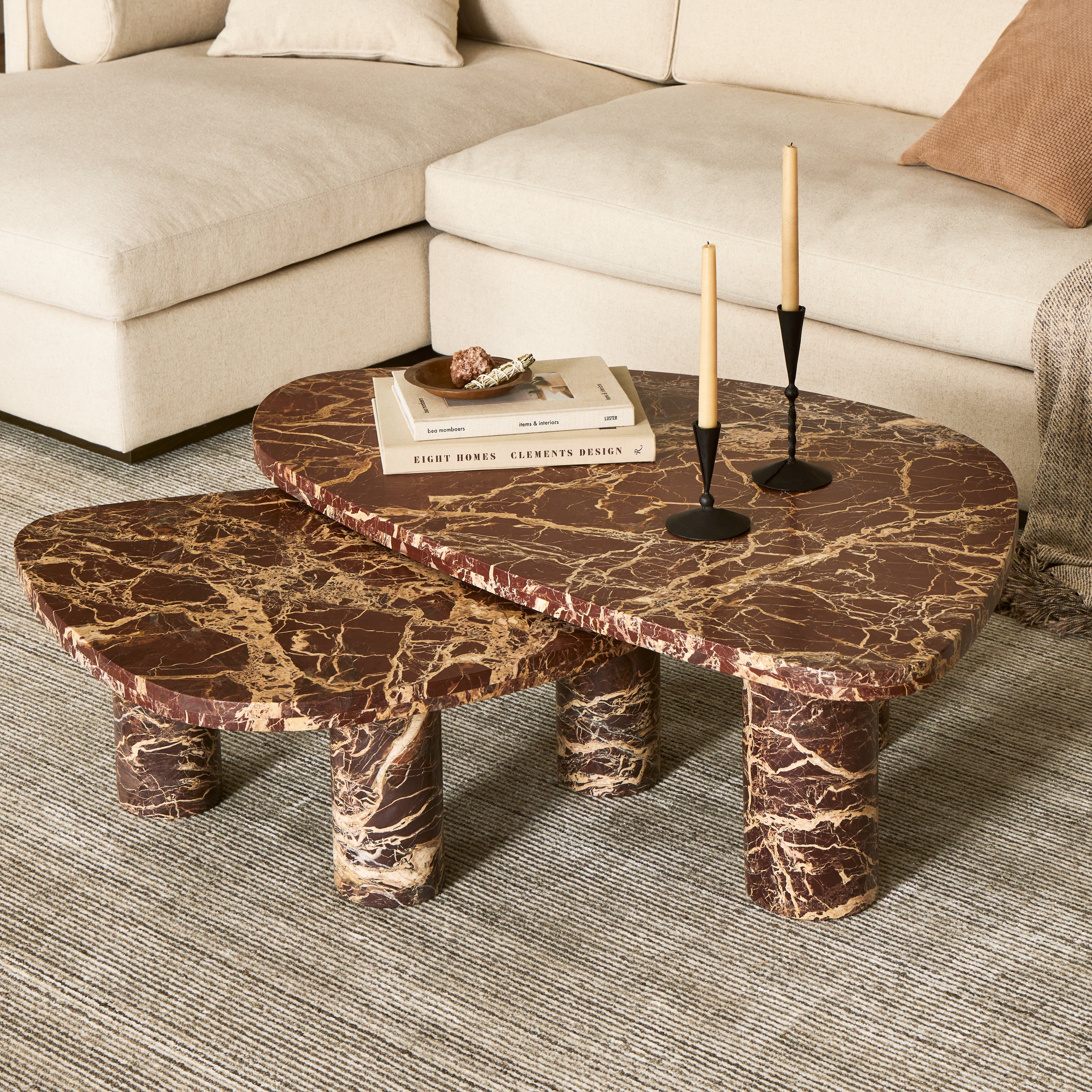 Made from solid marble with visible natural veining, turned pillar-style legs complement organically shaped tabletops, perfectly sized for nesting. Option to buy tables individually or together as a two-piece set. Amethyst Home provides interior design, new construction, custom furniture, and area rugs in the Dallas metro area.