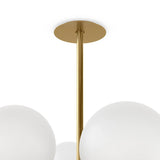 Matte glass spheres seem to extend and reach across smooth brass rods. Each globe is individually blown, shaped and sculpted by hand through a one-hour process. Matte glass is specially manufactured to evenly diffuse light. Brass and glass are 98% recyclable. Designed and sustainably crafted in Poland by Schwung.Overall Dimensions51.75"w x 51. Amethyst Home provides interior design, new home construction design consulting, vintage area rugs, and lighting in the Salt Lake City metro area.