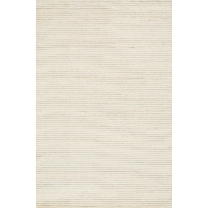 Hadley Ivory Rug - Amethyst Home Natural beauty is expressed in an understated fashion with the Hadley Collection, an eco-friendly collection of 100% undyed wool. Loom knotted, the Hadley features an intriguing cut pile and loop combination which adds distinctive texture to these handsome and durable designs. Also, the muted colors fit easily with a variety of interior styles while still earning notice with raw elegance.