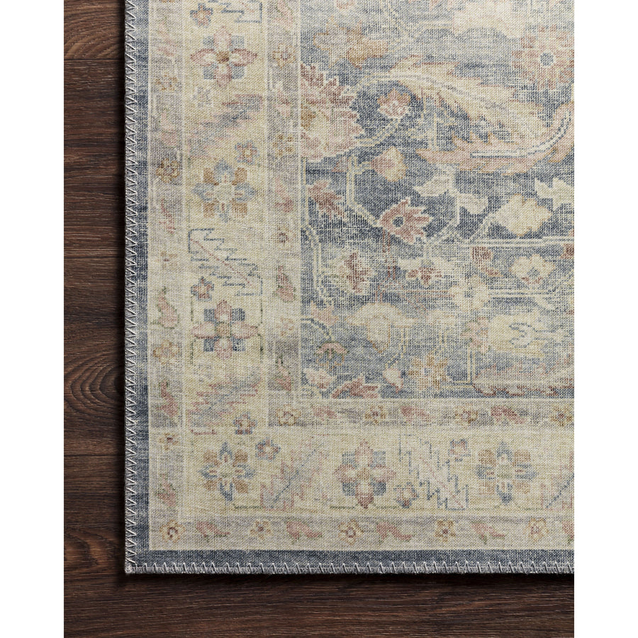 Featuring soft motifs in a carefully curated color palate of blue, yellow, red, and hints of orange, the Hathaway Denim / Multi area rug captures the essence of one-of-a-kind vintage or antique area rug. This rug is ideal for high traffic areas such as living rooms, dining rooms, kitchens, hallways, and entryways.