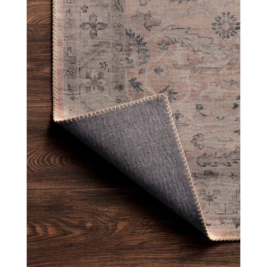 Featuring soft motifs in a carefully curated color palate of blush, pink, ivory, and hints of grey, the Hathaway Blush / Multi area rug captures the essence of one-of-a-kind vintage or antique area rug. This rug is ideal for high traffic areas such as living rooms, dining rooms, kitchens, hallways, and entryways.