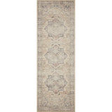 Featuring soft motifs in a carefully curated color palate of ivory, blue, green, and hints of purple, the Hathaway Multi / Ivory area rug captures the essence of one-of-a-kind vintage or antique area rug. This rug is ideal for high traffic areas such as living rooms, dining rooms, kitchens, hallways, and entryways.