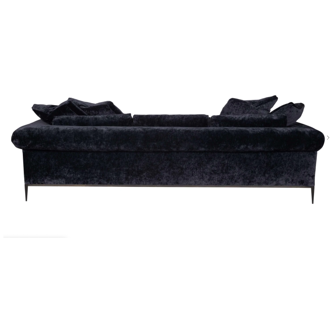 The Henrietta Upholstered Sofa Family by Cisco Brothers is the perfect centerpiece to your living room style. This dapper sofa has a distinctive style, with elegant roll arms and metal black-rust legs. Update your space with this mid-century influenced piece.