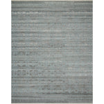 Both timeless and modern, the Idris Ocean/Smoke area rug from Loloi is meticulously hand-knotted in colors of blue and grey. The tonal series features an elevated texture, accentuating the detailed pattern. The Idris Ocean/Smoke rug, also known as ID-03 Ocean/Smoke, is hand-knotted of 70% Viscose and 30% Wool.