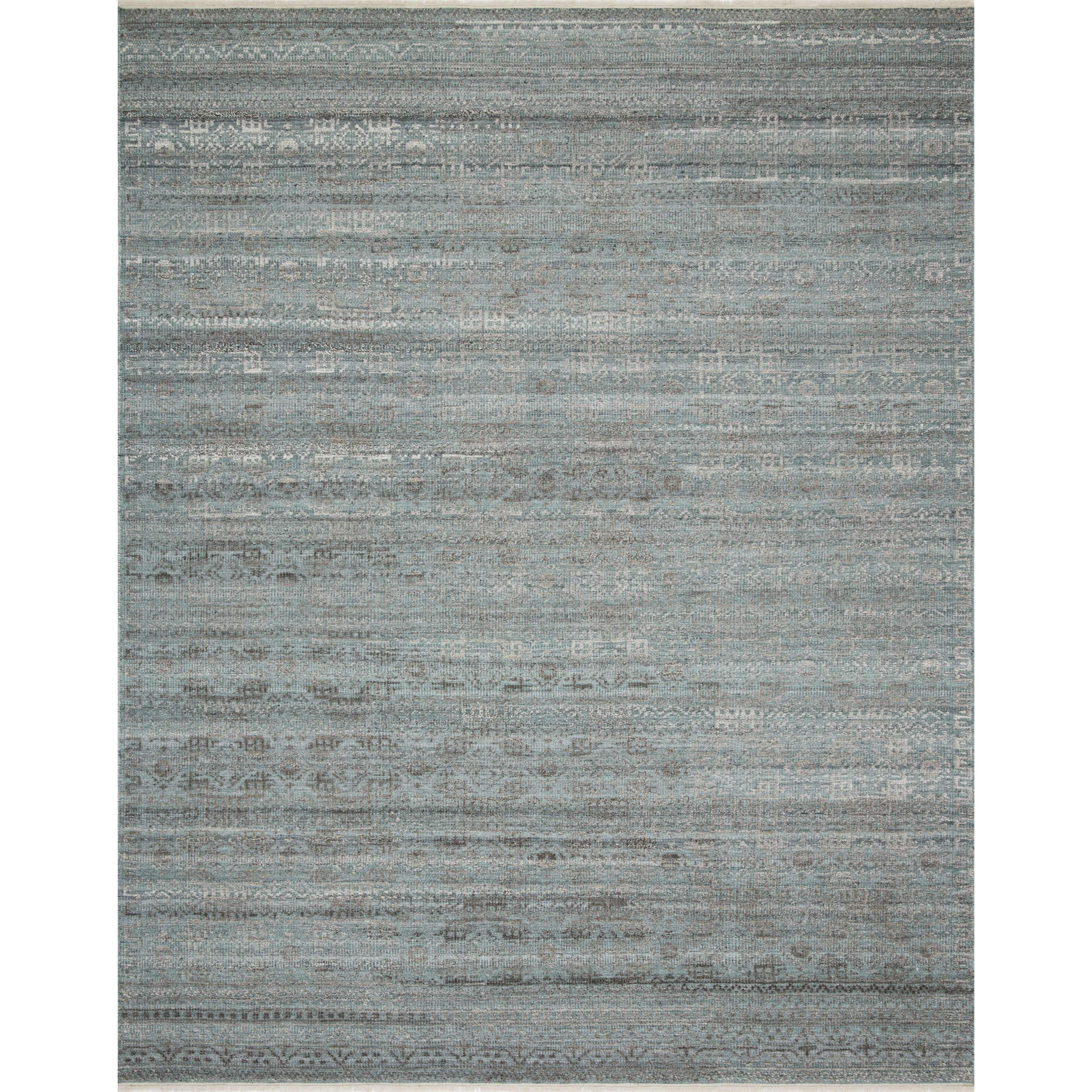 Both timeless and modern, the Idris Ocean/Smoke area rug from Loloi is meticulously hand-knotted in colors of blue and grey. The tonal series features an elevated texture, accentuating the detailed pattern. The Idris Ocean/Smoke rug, also known as ID-03 Ocean/Smoke, is hand-knotted of 70% Viscose and 30% Wool.