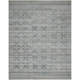 Both timeless and modern, the Idris Spa area rug from Loloi is meticulously hand-knotted in colors of blue, grey, and ivory. The tonal series features an elevated texture, accentuating the detailed pattern. The Idris Spa rug, also known as ID-03 Spa, is hand-knotted of 70% Viscose and 30% Wool.