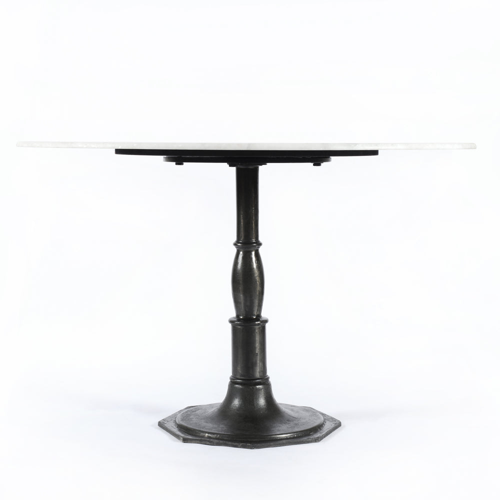 Featuring Lucy Carbon Wash Round Dining Table by Four Hands at Amethyst Home. The Lucy Carbon Wash Round Dining Table beautifully captures the French industrial meets dining table vibe. Beautifully detailed, 8-sided cast iron pedestal supports a dramatic white marble top with a bull-nosed edge.
Size: 48"w x 48"d x 30"hWeight: 227.17 lbs
Size: 60"w x 6.  Amethyst Home provides interior design, new home construction design consulting, vintage area rugs, and lighting in the Salt Lake City metro area.