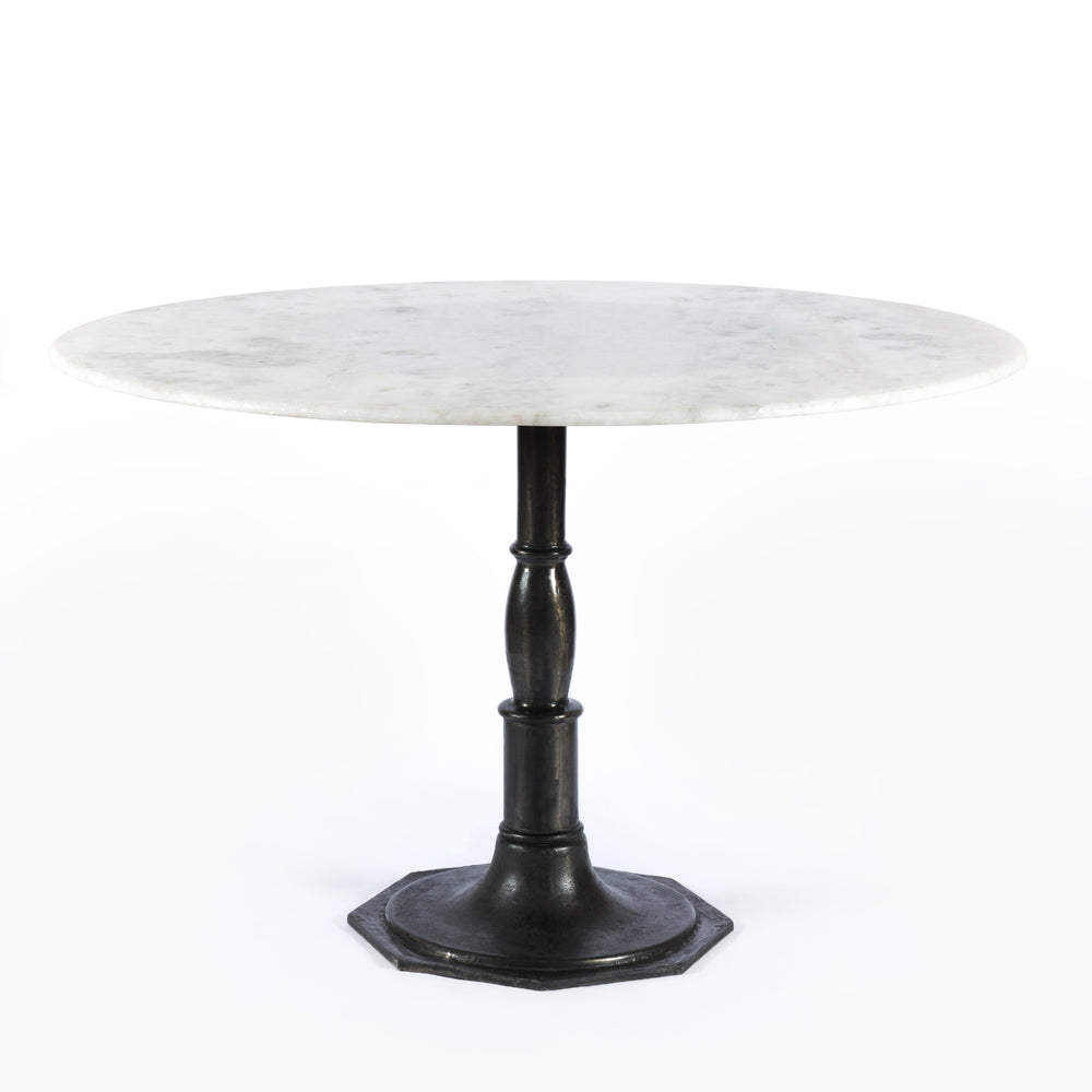 Featuring Lucy Carbon Wash Round Dining Table by Four Hands at Amethyst Home. The Lucy Carbon Wash Round Dining Table beautifully captures the French industrial meets dining table vibe. Beautifully detailed, 8-sided cast iron pedestal supports a dramatic white marble top with a bull-nosed edge.
Size: 48"w x 48"d x 30"hWeight: 227.17 lbs
Size: 60"w x 60"d.  Amethyst Home provides interior design, new home construction design consulting, vintage area rugs, and lighting in the Los Angeles metro area.