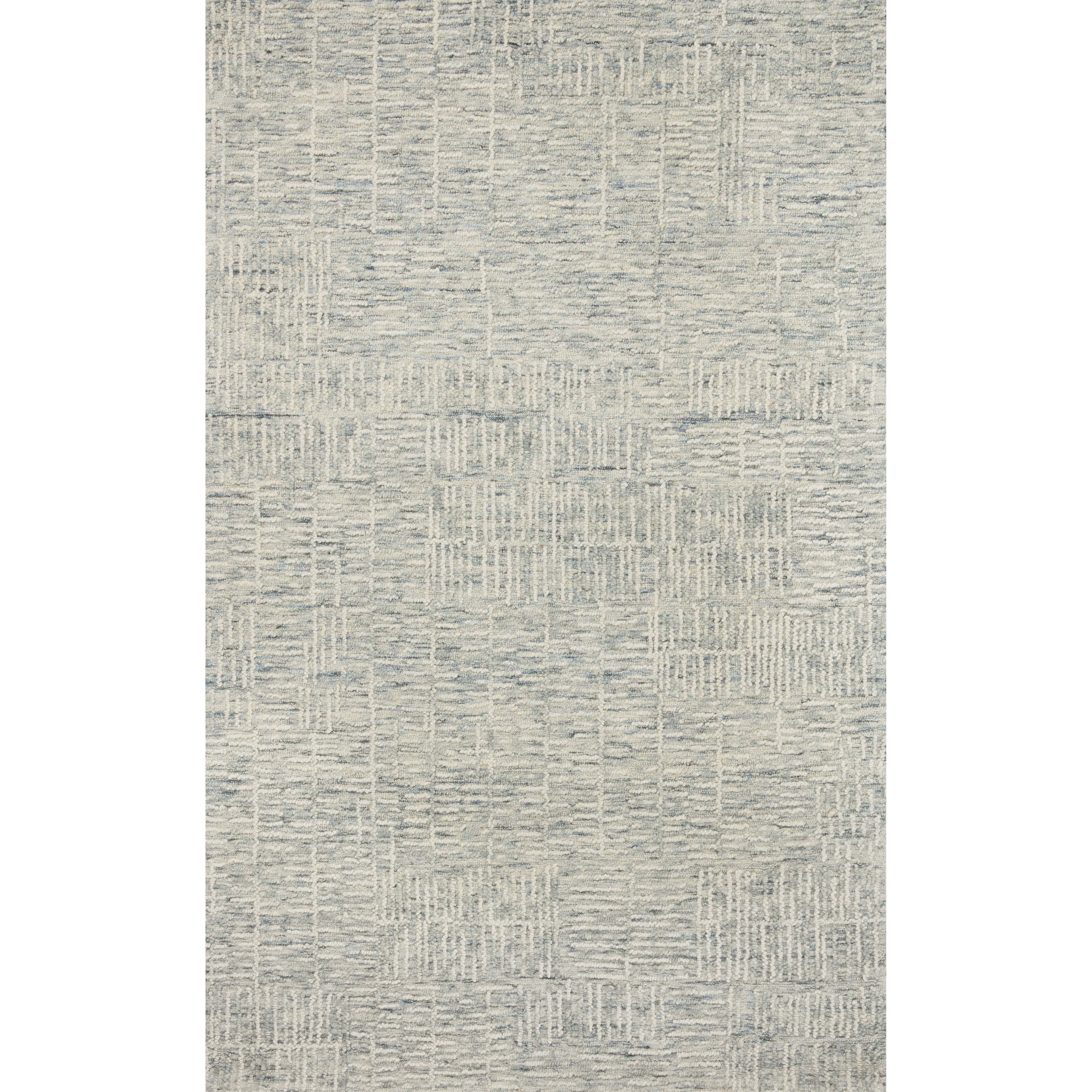 Hand-crafted with a combination of thick and fine yarns, the Tallulah Sky / Ivory Rug area rug creates dynamic dimension in living rooms, bedrooms, and more. The thicker yarns define the abstract, linear design, giving the rug a distinct high-low texture and sense of movement. Tallulah's soft, neutral palettes have a depth of tone inspired by watercolor pigmentation. Amethyst Home provides interior design, new construction, custom furniture, and area rugs in the Kansas City metro area.