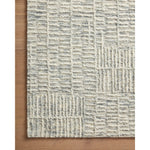 Hand-crafted with a combination of thick and fine yarns, the Tallulah Sky / Ivory Rug area rug creates dynamic dimension in living rooms, bedrooms, and more. The thicker yarns define the abstract, linear design, giving the rug a distinct high-low texture and sense of movement. Tallulah's soft, neutral palettes have a depth of tone inspired by watercolor pigmentation. Amethyst Home provides interior design, new construction, custom furniture, and area rugs in the Omaha metro area.