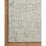 Hand-crafted with a combination of thick and fine yarns, the Tallulah Sky / Ivory Rug area rug creates dynamic dimension in living rooms, bedrooms, and more. The thicker yarns define the abstract, linear design, giving the rug a distinct high-low texture and sense of movement. Tallulah's soft, neutral palettes have a depth of tone inspired by watercolor pigmentation. Amethyst Home provides interior design, new construction, custom furniture, and area rugs in the Omaha metro area.
