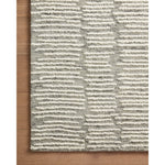 Hand-crafted with a combination of thick and fine yarns, the Tallulah Stone / Ivory Rug area rug creates dynamic dimension in living rooms, bedrooms, and more. The thicker yarns define the abstract, linear design, giving the rug a distinct high-low texture and sense of movement. Tallulah's soft, neutral palettes have a depth of tone inspired by watercolor pigmentation. Amethyst Home provides interior design, new construction, custom furniture, and area rugs in the Laguna Beach metro area.