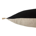 The Loma Pillow has cute tassels found on all four corners with a cute, detail stripe found in the middle. Place on your bed or sofa, this jet black pillow will bring the whole room some texture and pop color. Insert is made with 100% down.   Size: 22" x 22"  100% Linen Zipper Closure India  Professional Cleaning Recommended