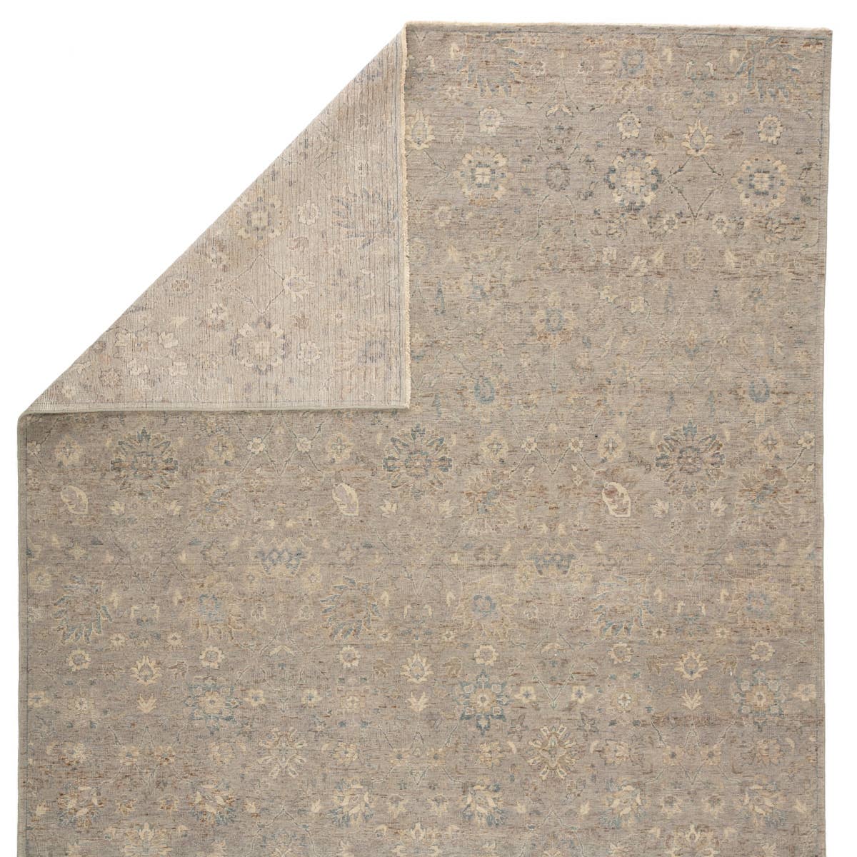 The Tierzah Pembe Area Rug by Jaipur Living, or TRZ02, boasts a Persian knot construction and tonal gray, beige, and brown palette that grounds any space. This artisan-made rug features fringe trimmed details for a touch of global charm. This is perfect for your living room, bedroom, or other medium traffic area. 