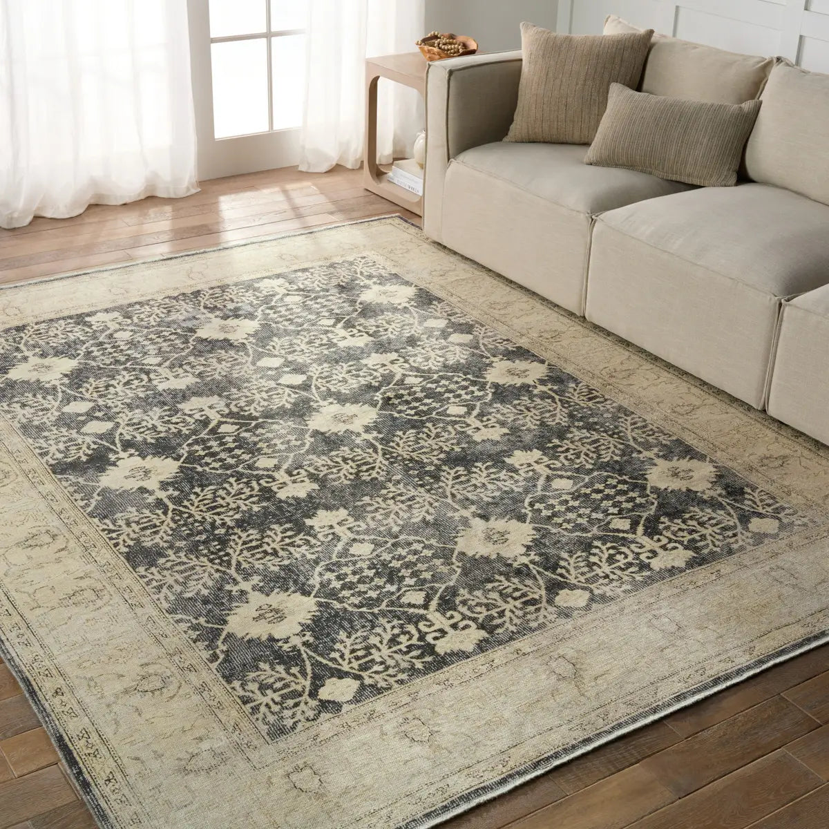 Featuring Boheme Pia Rug by Jaipur Living at Amethyst Home. The Boheme Pia Rug brings vintage inspiration to life with ornate, worldly designs and a timeless distress effect. The Pia area rug boasts a Persian-inspired center medallion, short fringe and detail-rich border in a navy, cream, gray, and pastel green colorway. This zero-pile rug is printed on cotton, polyester, and soft chenille. Amethyst Home provides interior design services, furniture, rugs, and lighting in the Des Moines metro area.
