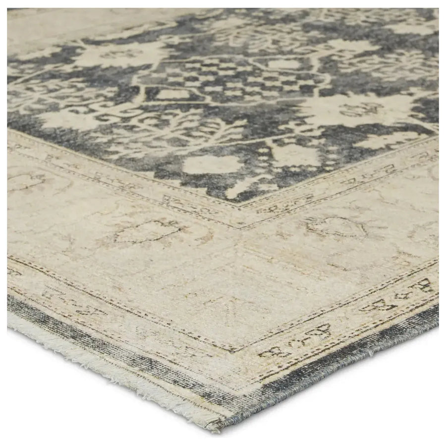 The Boheme Pia Rug brings vintage inspiration to life with ornate, worldly designs and a timeless distress effect. The Pia area rug boasts a Persian-inspired center medallion, short fringe and detail-rich border in a navy, cream, gray, and pastel green colorway. Amethyst Home provides interior design services, furniture, rugs, and lighting in the Salt Lake City metro area.