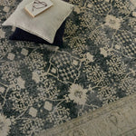 Featuring Boheme Pia Rug by Jaipur Living at Amethyst Home. The Boheme Pia Rug brings vintage inspiration to life with ornate, worldly designs and a timeless distress effect. The Pia area rug boasts a Persian-inspired center medallion, short fringe and detail-rich border in a navy, cream, gray, and pastel green colorway. This zero-pile rug is printed on cotton, polyester, and soft chenille fo. Amethyst Home provides interior design services, furniture, rugs, and lighting in the Seattle metro area.