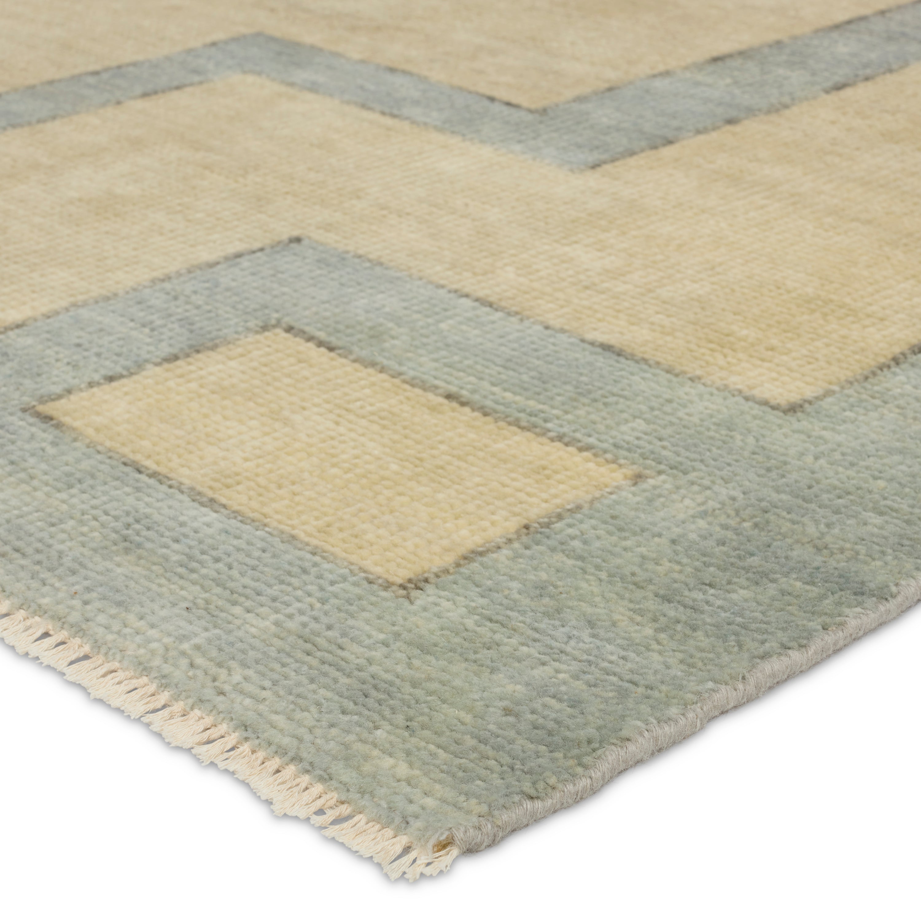 The hand-knotted Cyprus collection showcases a modern representation of vintage Kars designs with clean-lined geometric details and fresh colorways. The blue, cream, gray, and caramel colored Nicosia design delights with a minimalistic medallion pattern and multiple borders. Low pile and naturally stain resistant fibers allow for easy care and cleanup. Amethyst Home provides interior design, new construction, custom furniture, and area rugs in the Tampa metro area.