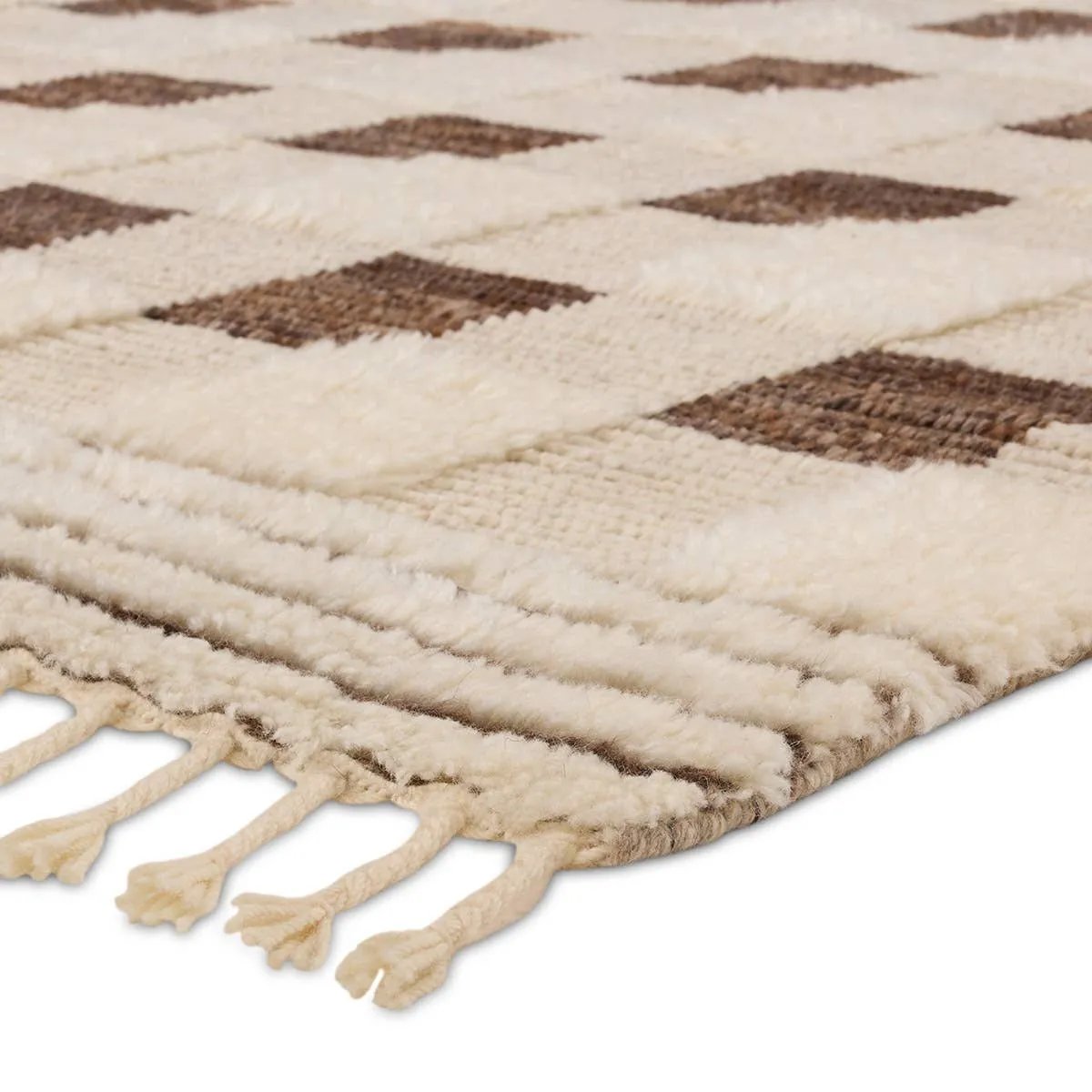 The Desouk Berkshire melds modern allure with the global vibes of Morocco. The Berkshire hand-knotted rug showcases a geometric grid pattern with contrasting brown, cream, and tan tones. This handcrafted rug boasts plush, cut wool pile that pairs beautifully with braided tassel details. Amethyst Home provides interior design, new home construction design consulting, vintage area rugs, and lighting in the Scottsdale metro area.