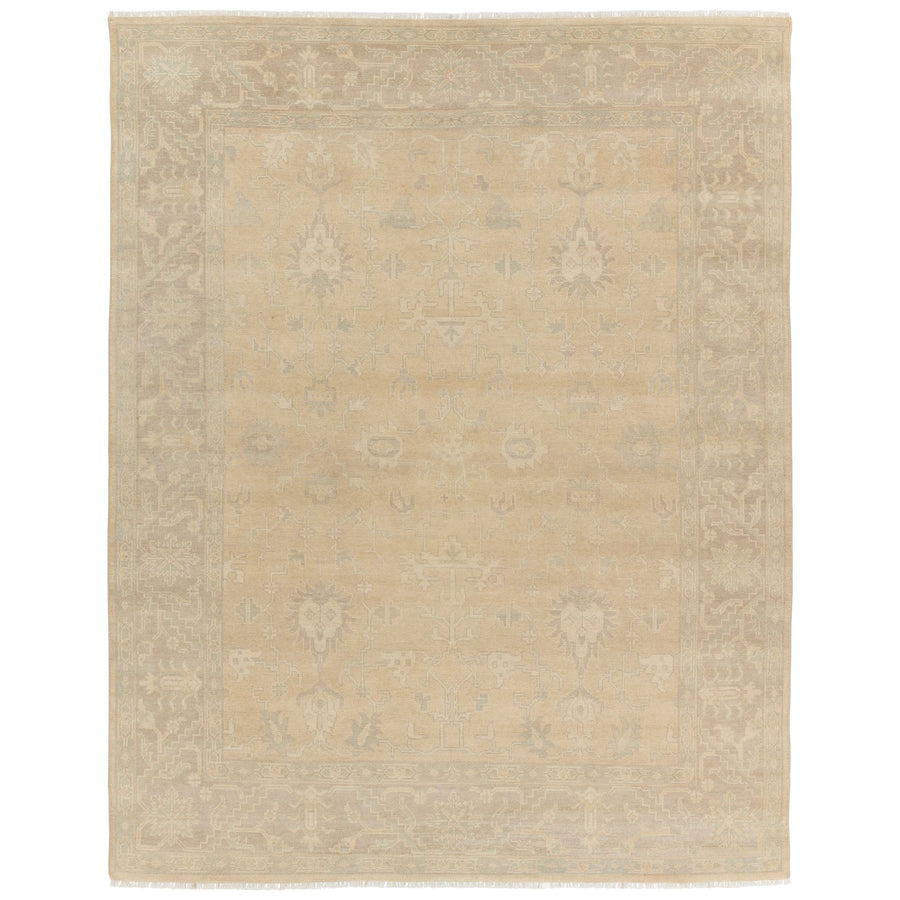 The Eloquent collection emanates traditional elegance, lending a soft and serene look to transitional homes. The Verity area rug features a faded Oushak design cream, gray, and light sage tones. This hand-knotted wool and viscose rug grounds living spaces with a classic, earthy look. Amethyst Home provides interior design, new construction, custom furniture, and area rugs in the Charlotte metro area.