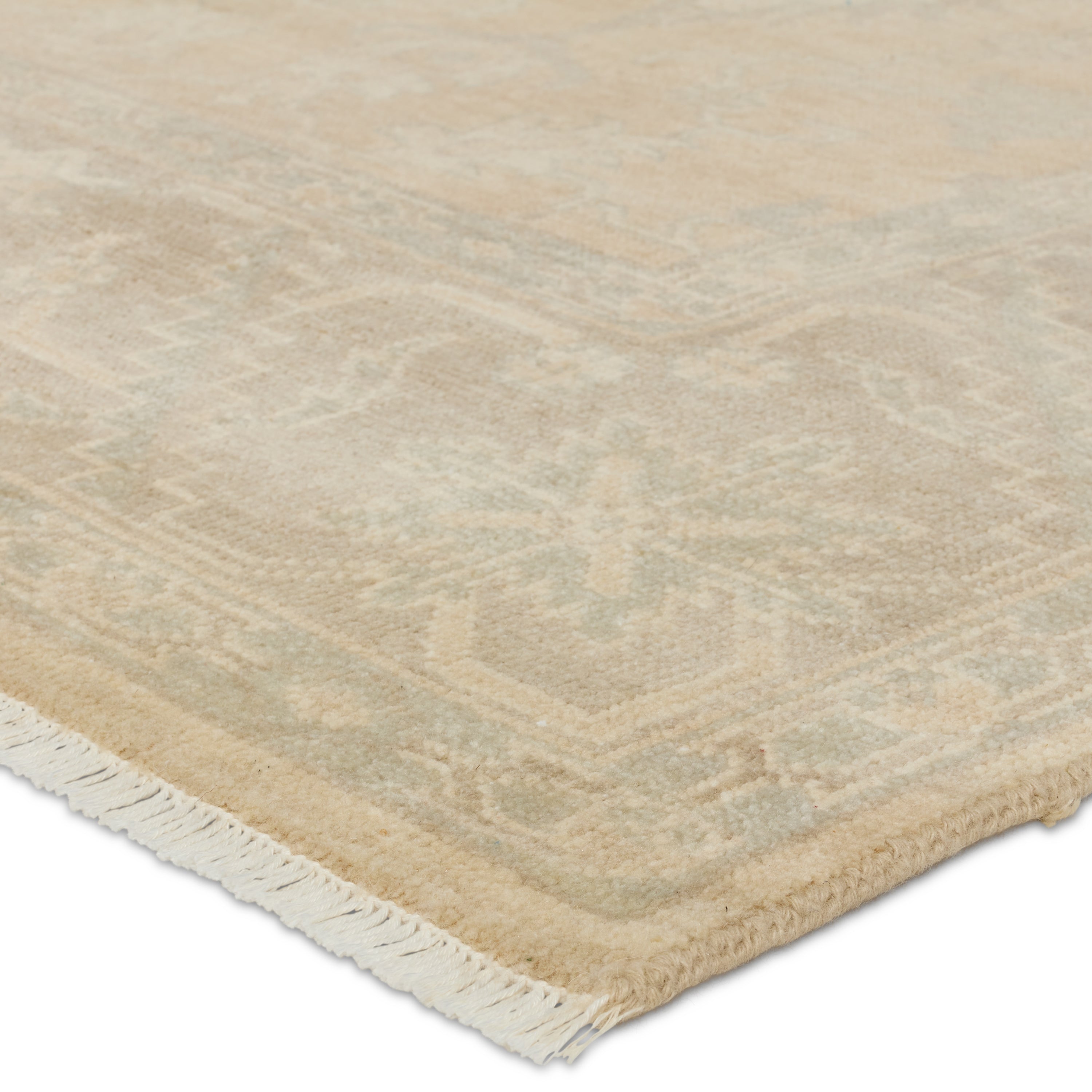 The Eloquent collection emanates traditional elegance, lending a soft and serene look to transitional homes. The Verity area rug features a faded Oushak design cream, gray, and light sage tones. This hand-knotted wool and viscose rug grounds living spaces with a classic, earthy look. Amethyst Home provides interior design, new construction, custom furniture, and area rugs in the Kansas City metro area.