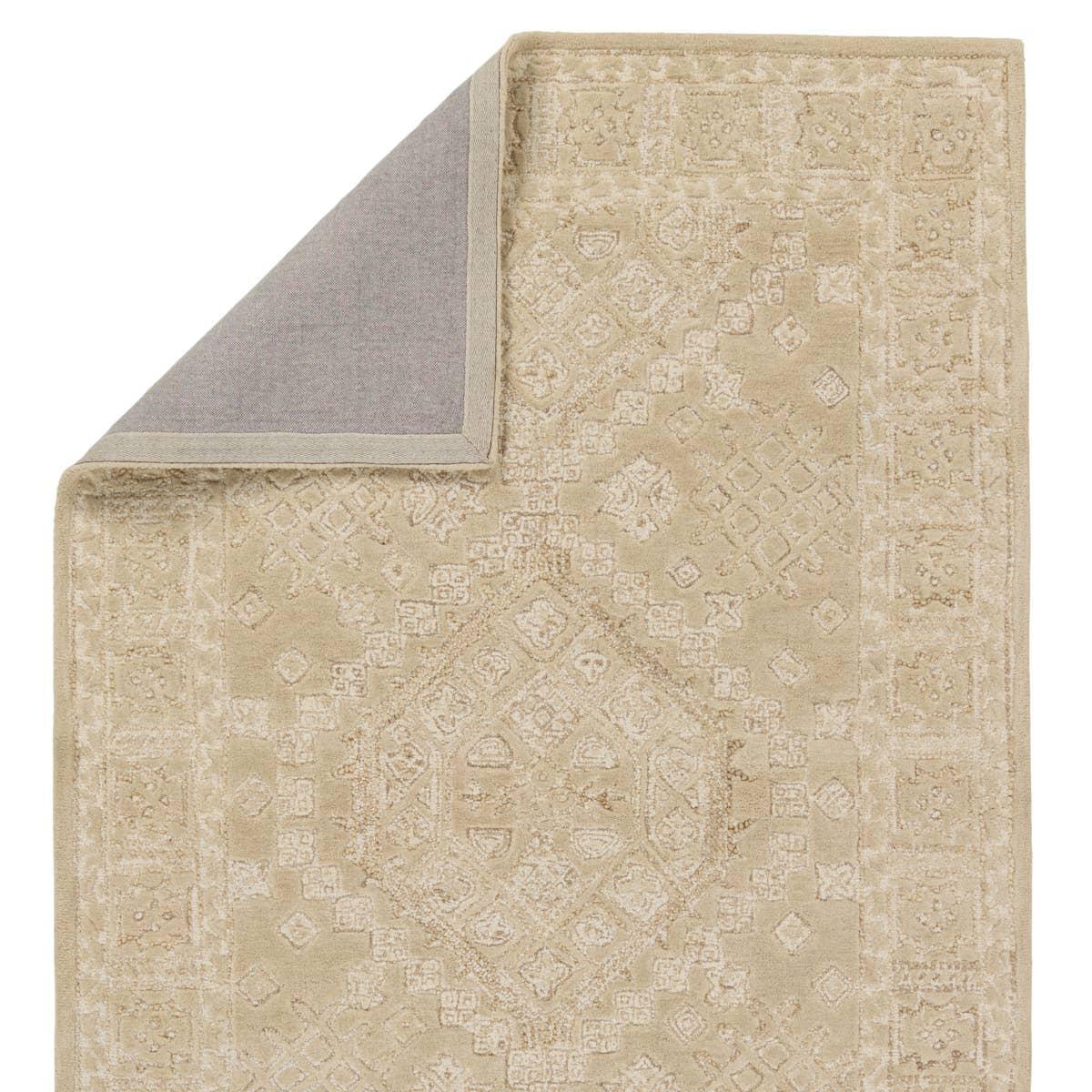 The Farryn Tomoes boasts masterfully hand-tufted designs with stunning detail and versatile colorways. The Tomoe rug features a tribal-inspired center medallion in warm hues of tan and cream. This transitional design is crafted of durable wool and complements a variety of styles, from global to rustic decor. Amethyst Home provides interior design, new home construction design consulting, vintage area rugs, and lighting in the Boston metro area.