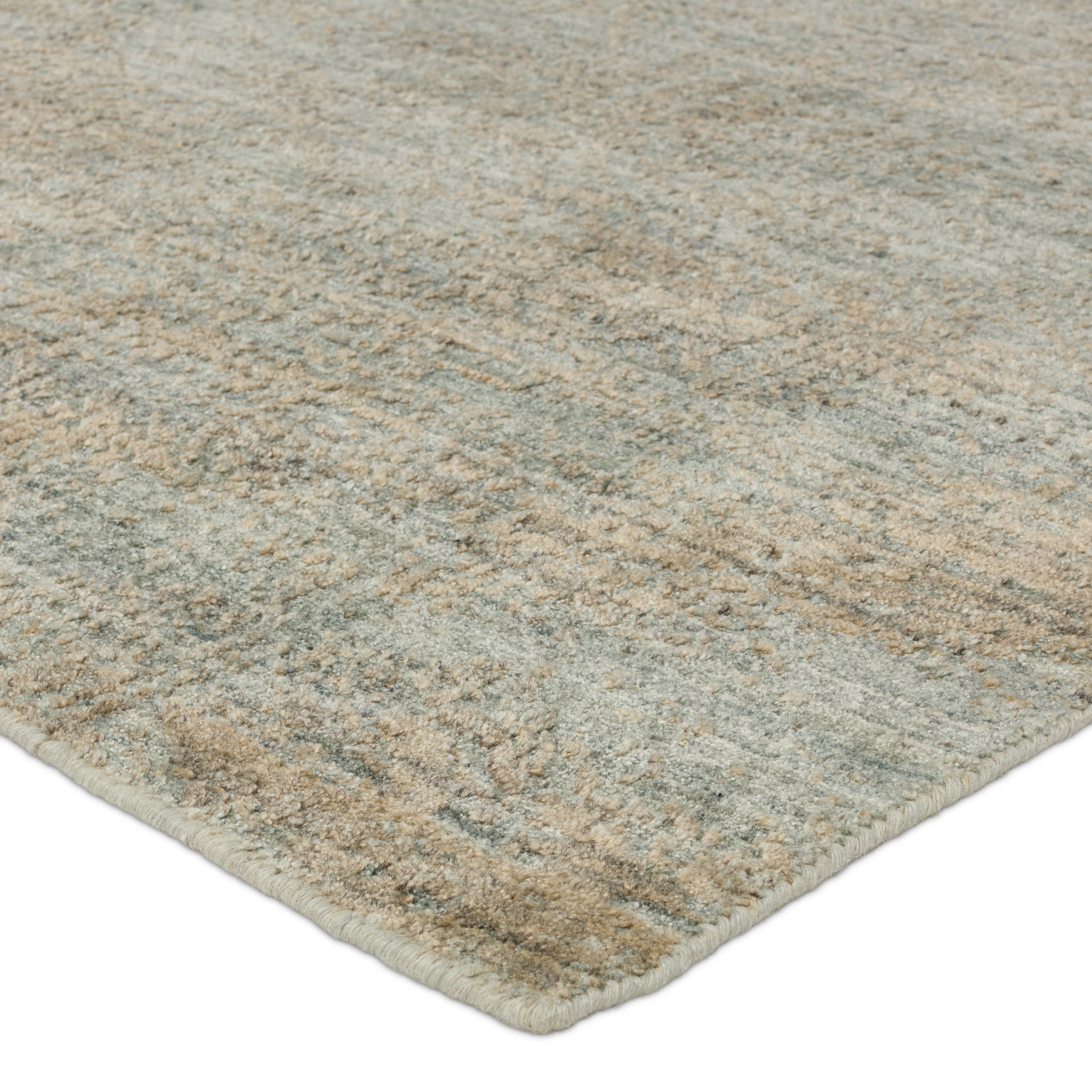 The elegant and modernized designs of the Genevieve collection feature an exquisite hand-loomed jacquard weave with stunning texture. The Arano rug boasts hand-embossed details in a balanced, versatile colorway of taupe, tan, gray, and cream tones. A blend of wool and soft viscose lends dimension and depth to this handwoven rug. Amethyst Home provides interior design, new construction, custom furniture, and area rugs in the Scottsdale metro area.