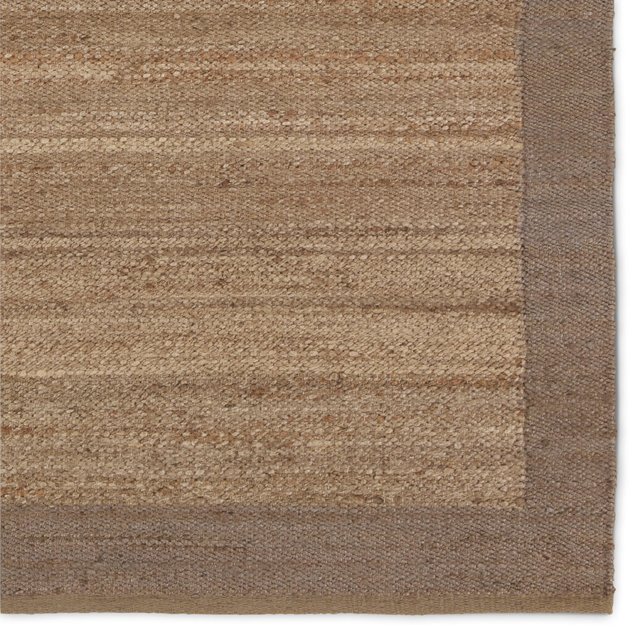The Hanover collection features timeless, textural designs that anchor traditional and contemporary spaces alike. These woven natural jute rugs showcase a classic border design and neutral colorways for effortless versatility. The Query rug utilizes a lighter and darker brown to create contrast. Theis handcrafted accent works best in low traffic areas of the home. Amethyst Home provides interior design, new construction, custom furniture, and area rugs in the Alpharetta metro area.