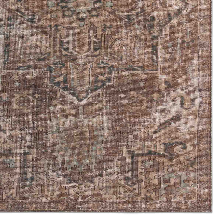 Inspired by well-traveled vintage designs, Kate Lester has joined with Jaipur Living to launch the Harman Hold Rug. This impressive assortment of antique textile designs lends heirloom-quality looks and livable style to any space. The Minita area rug showcases a faded medallion pattern emphasized by hues of brown, tan, and hints of blue. Amethyst Home provides interior design services, furniture, rugs, and lighting in the Kansas City metro area.