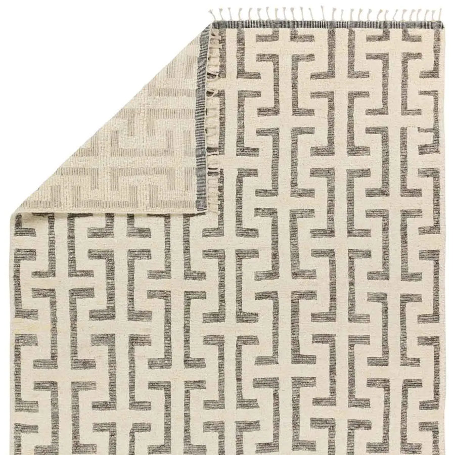 The Keoka Semra Rug boasts a fresh take on classic Afghani hand-knotted textiles. In rich, grounding tones of gray and ivory, the stylish contrast of the rug anchors room with bold yet neutral appeal. Amethyst Home provides interior design services, furniture, rugs, and lighting in the Des Moines metro area.