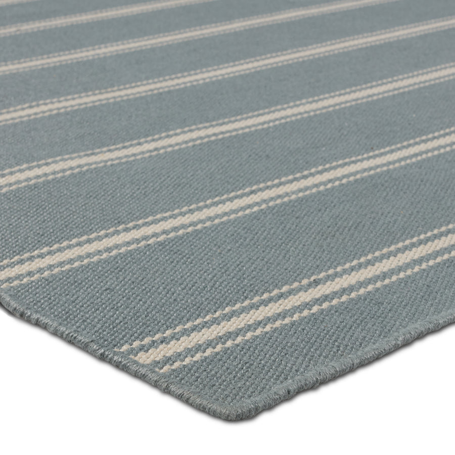 The handwoven Laguna collection is an easy-going, classic statement for both indoor and outdoor spaces. Crafted of soft, flatwoven PET yarns, these traditional hues and striped designs set the tone for simple sophistication. The Memento rug utilizes thin and thick stripes to add dimension and style. The slate and ivory colorway delights in both high and low traffic areas of the home. Amethyst Home provides interior design, new construction, custom furniture, and area rugs in the Houston metro area.
