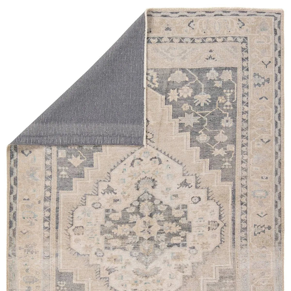 Distressed, vintage designs offer an elevated tone for the Lumal Collection. The Pasin rug features an updated traditional inspired medallion and multiple floral borders in tones of navy, light green, cream, gray, and tan. This machine washable rug is stain resistant and easy to clean, perfect for homes with children and pets. Amethyst Home provides interior design, new home construction design consulting, vintage area rugs, and lighting in the Scottsdale metro area.