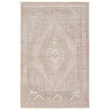 Distressed, vintage designs offer an elevated tone for the Lumal Collection. The Orame rug features a Southwestern-inspired medallion, geometric border, and intricate detailing in tones of mauve, light blue, brown, and cream. This machine washable rug is stain resistant and easy to clean, perfect for homes with children and pets. Amethyst Home provides interior design, new home construction design consulting, vintage area rugs, and lighting in the Miami metro area.